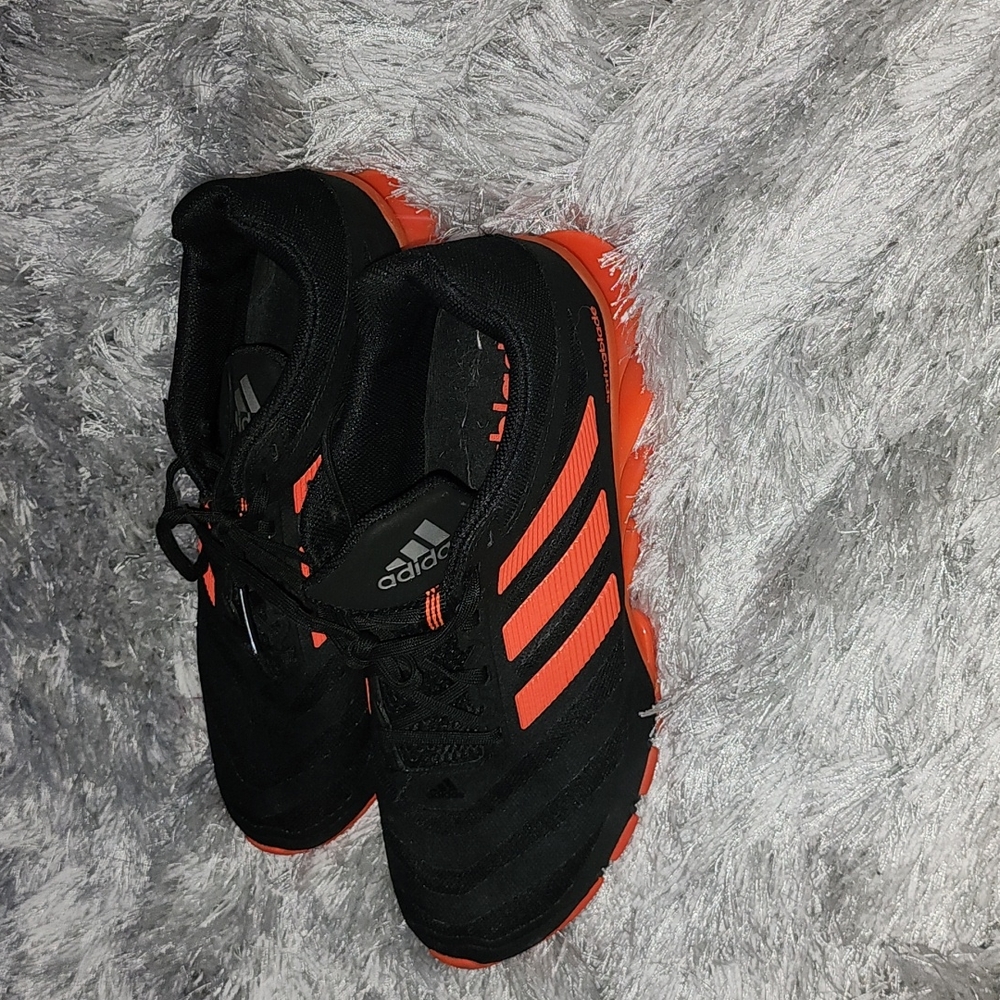 Spring blade tennis shoe